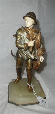 Lot 1551 - Georges Omerth (French fl.1895-1925): "Old Fisherman" A Patinated Bronze and Ivory Figure, modelled