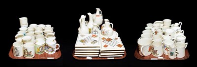 Lot 104 - Crested china to include mugs, jugs square and circular teapot stands (approximately 64)