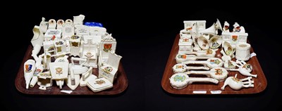 Lot 111 - Crested china to include chairs, musical instruments, irons etc (approximately 62)