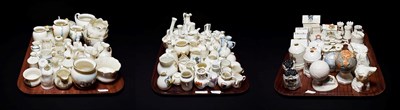 Lot 115 - Crested china to include jugs, bathing huts, barrels, binoculars, globes etc (approximately 125...