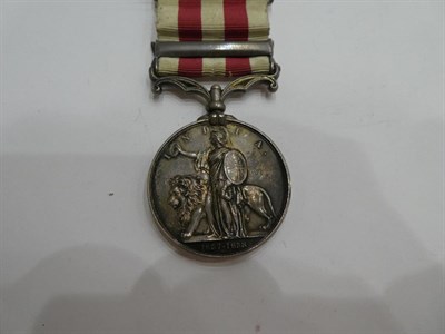 Lot 9 - A Victorian Group of Three Medals, comprising Crimea Medal with clasp SEBASTAPOL, awarded to LIEUT.