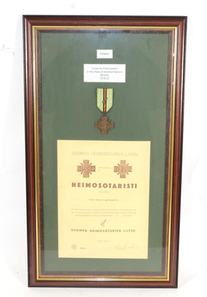 Lot 30 - A Kindred Nations War Cross in Bronze, to Viljo Nestori Aartkoakelle, with certificate, framed.