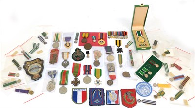 Lot 41 - A Collection of Miniature Medals and Insignia, including Rhodesian miniatures, World Medals and...