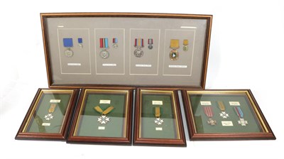 Lot 45 - Five Glazed Displays of Rhodesian Medals:- District Service Medal, General Service Medal, Exemplary