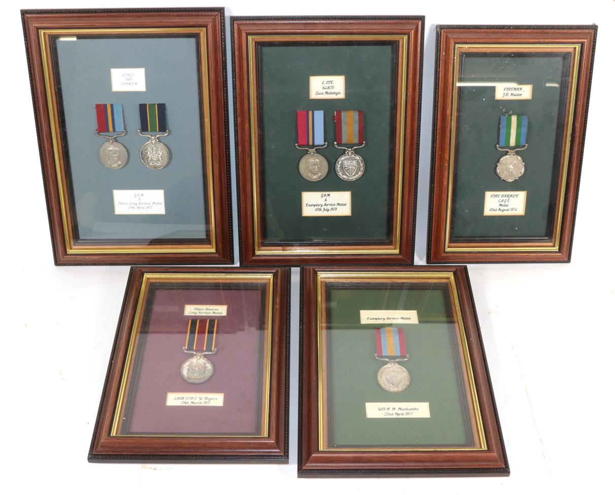 Lot 47 - A Collection of Seven Rhodesian Service Medals:- Exemplary Service Medal (WO1 N M Mashumba);...