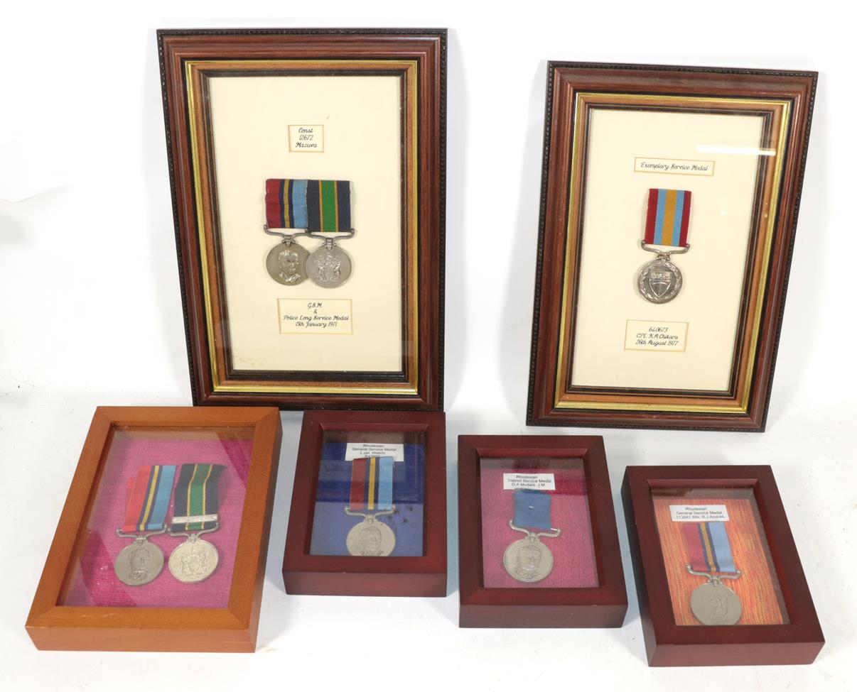 Lot 48 - A Collection of Eight Rhodesian Service Medals:- Rhodesian GSM & Police LSGC with Bar Pair...