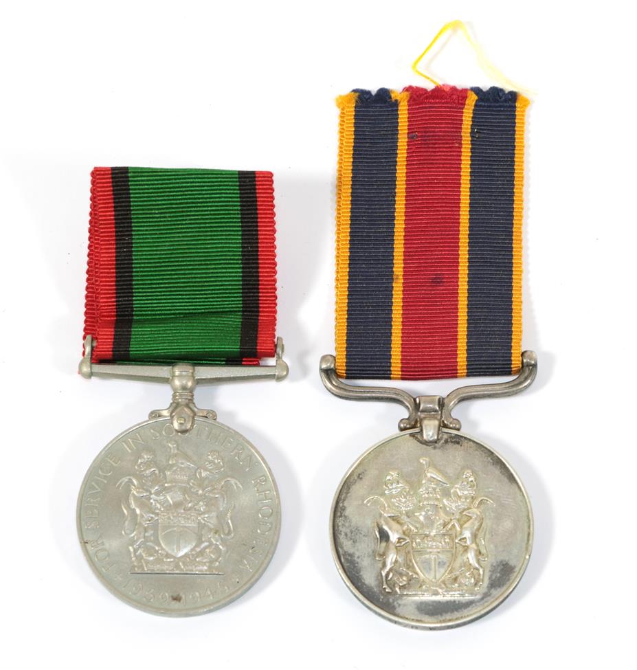 Lot 56 - A Southern Rhodesia Service Medal & Police Reserve Faithful Service Medal, to 4261F F/R W...