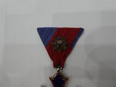Lot 62 - A Continental Blue and Red Enamelled Garter Breast Star, Breast Badge and Collar Badge