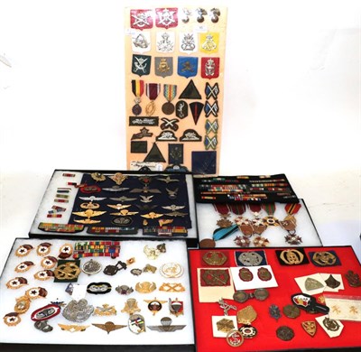 Lot 95 - A Collection of Foreign Badges and Medals, including Polish Cross of Merit, Dutch, USSR cap and...