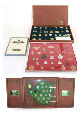 Lot 96 - A Quantity of Rhodesian Cap and Collar Badges, in a teak case, two glazed frames and a...