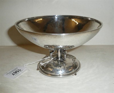 Lot 1567 - An Arts and Crafts Guild of Handicrafts Silver Pedestal Bowl, the hammered bowl on three cast...