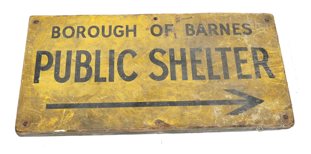 Lot 129 - A Second World War Sign for the Borough of Barnes Public Shelter, with black lettering on a...