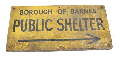 Lot 129 - A Second World War Sign for the Borough of Barnes Public Shelter, with black lettering on a...
