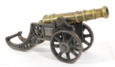 Lot 155 - A Victorian Brass Signal Cannon, the 26cm triple ringed barrel with globular cascabel,...