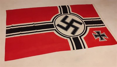 Lot 169 - A German Third Reich Kriegsmarine Battle Flag, in printed linen, the hoist stencilled...