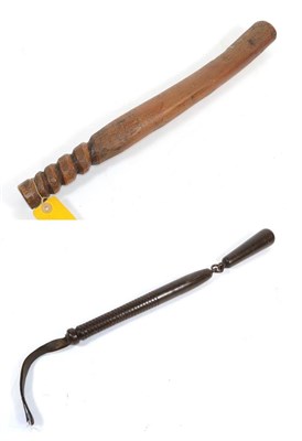 Lot 180 - A 19th Century Dark Stained Wood Bludgeon, of the flail type, with metal linkage, ringed grip...