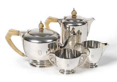 Lot 1574 - An Art Deco Four Piece Teaset, Edward Barnard & Sons Ltd, London 1934, Jubilee mark, the plain...