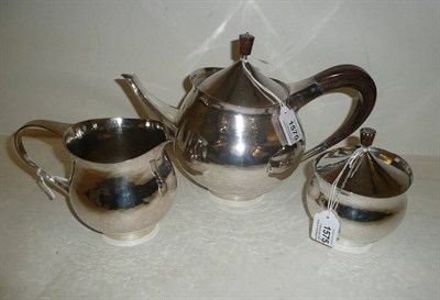 Lot 1575 - A Three Piece Silver Teaset, by Graham Watling of Lacock, London 1965, comprising teapot and...