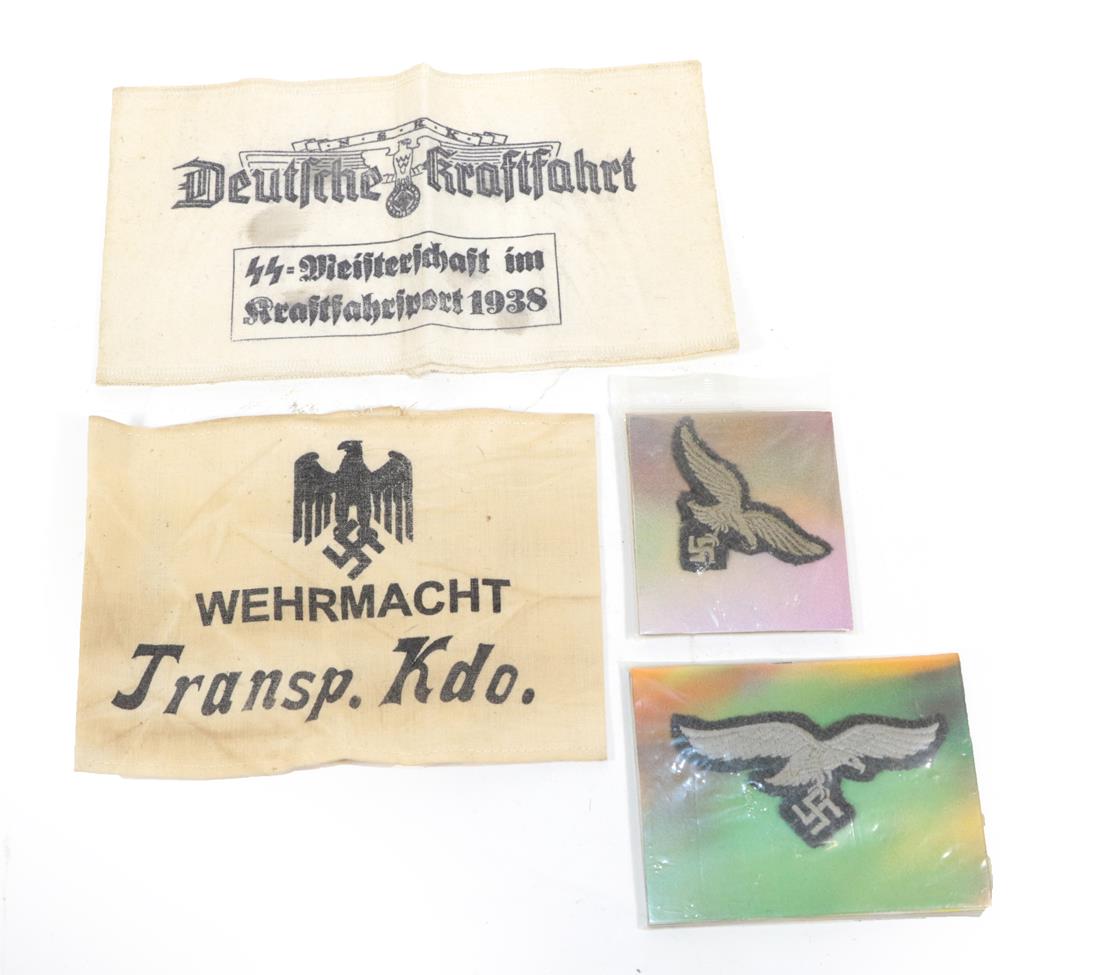 Lot 220 - A German Third Reich White Cotton Armband, printed in black with eagle and swastika over...