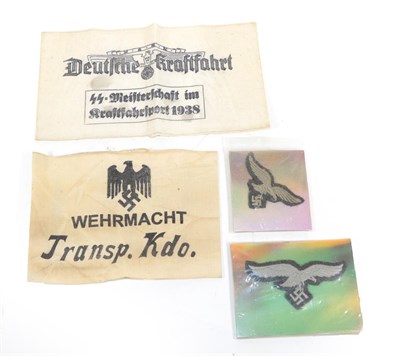 Lot 220 - A German Third Reich White Cotton Armband, printed in black with eagle and swastika over...