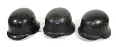 Lot 222 - A German Third Reich Fire Police Helmet, with black finish, single decal, the underside of the back