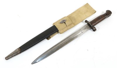 Lot 300 - A British 1903 SMLE Bayonet, the 30cm steel blade with bluing at the ricasso, one side stamped with