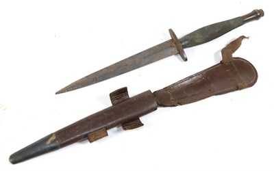 Lot 304 - A Second World War Fighting Knife Second Pattern B2, with 16.5cm hand forged blued steel blade, the