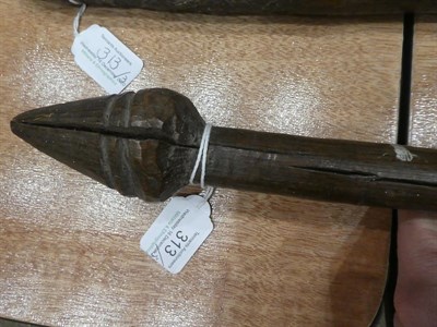 Lot 313 - Two Early 19th Century Australian Aboriginal Waddies, one following the natural curves of a branch