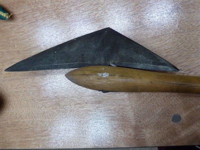 Lot 316 - A 20th Century Zulu War Axe, the 39cm crescent shape blade with cylindrical tang inserted into...