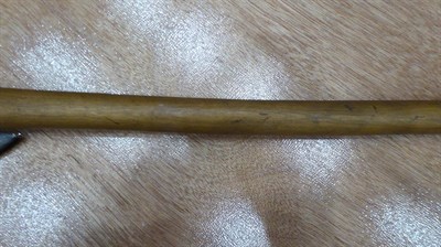 Lot 316 - A 20th Century Zulu War Axe, the 39cm crescent shape blade with cylindrical tang inserted into...