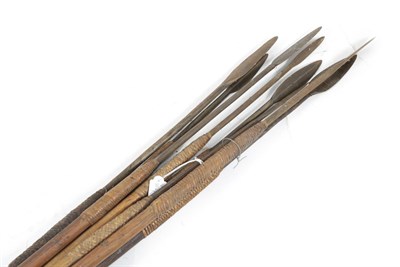 Lot 322 - A Collection of Eight Late 19th Century Zulu Throwing Spears (Isijula), each with small leaf...