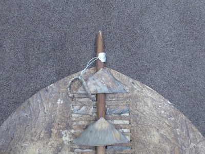 Lot 328 - Two 20th Century Zulu Cow Hide Shields, each of tan and white colouring, of elliptical form,...