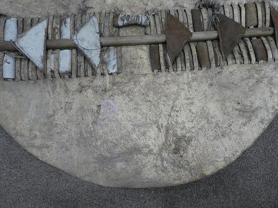 Lot 329 - Two 20th Century Zulu Cow Hide Shields, each of tan and white colouring, of elliptical form,...