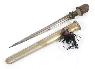 Lot 341 - A 19th Century Bhutanese Dagger, with an unusual 25cm fullered triangular section steel blade,...