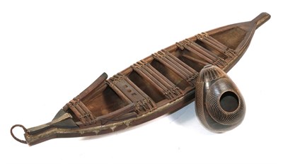 Lot 347 - A 20th Century Carved Wood Model of a Five Man Canoe/Sailing Boat, possibly Solomon Islands,...