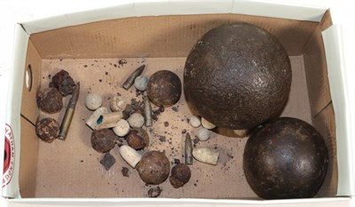 Lot 358 - An Early Nine Pounder Iron Cannon Ball, 33cm circumference, a four pounder cannon ball, 24cm...