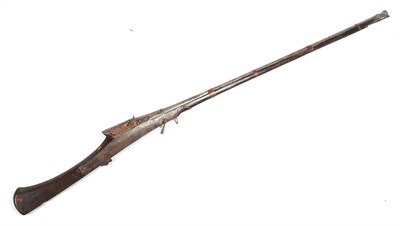 Lot 383 - An Early 19th Century Indian Matchlock Torador (Musket), the 119cm steel barrel with waisted...