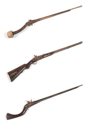 Lot 386 - A 19th Century Afghan Flintlock Jezail, the 97cm steel barrel with flared muzzle, rounded lock...