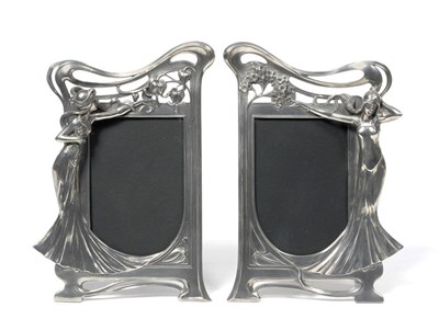 Lot 1596 - A Pair of Art Nouveau WMF Pewter Photograph Frames, Model No.18 and 18a, the shaped sinuous...