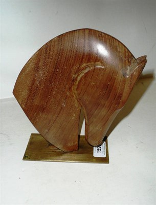 Lot 1599 - A Mahogany Bookend, by Laszlo Hoenig, modelled as a horses head, on a brass base, stamped...