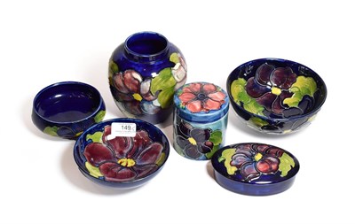 Lot 149 - Six Walter Moorcroft Clematis pattern wares, including two bowls, oval trinket box and cover,...