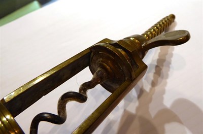 Lot 156 - Two Farrow and Jackson type brass corkscrews, Probably mid to late 19th century, one patinated,...