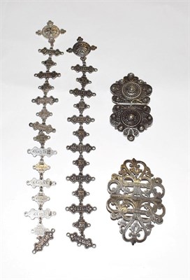 Lot 162 - A silver nurse's buckle, T. Bros, Birmingham, pierced foliate scrollwork, in two sections; with...