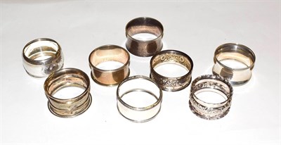 Lot 193 - Eight various silver napkin-rings, variously decorated, 4oz 2dwt (8)