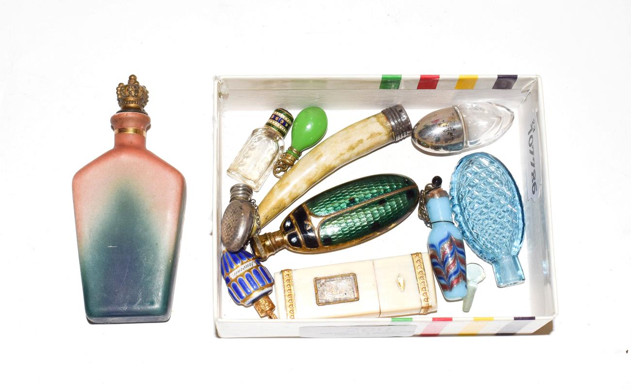 Lot 200 - A group of assorted scent-bottles, including: a cut-glass bottle with gold and enamel cover,...