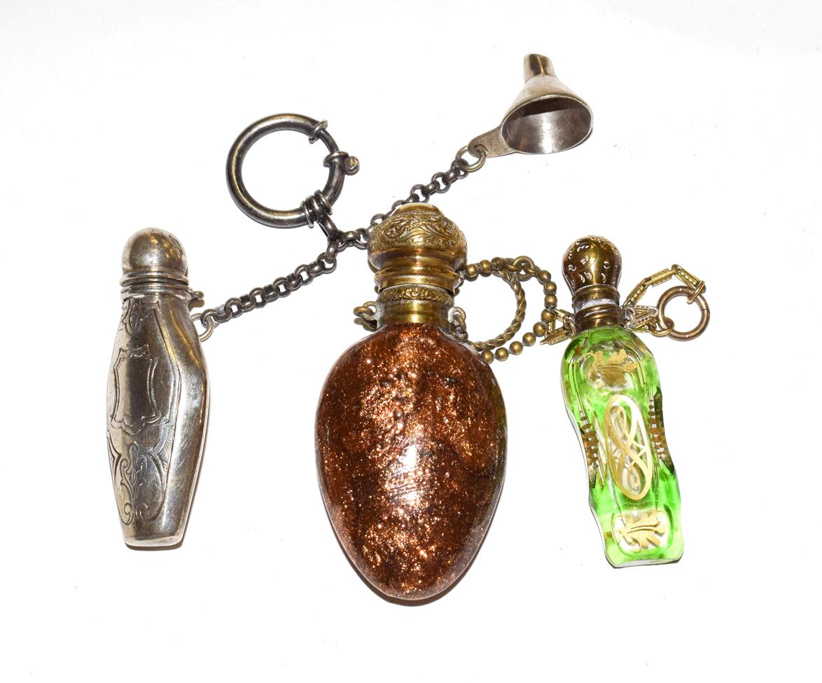 Lot 201 - Three scent-bottles, one of adventurine glass with brass mounts; another green glass,...