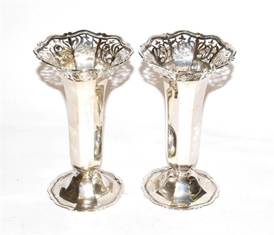 Lot 236 - A pair of George V silver vases, by the Goldsmiths and Silversmiths Co. Ltd., London, one 1910...