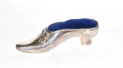 Lot 244 - A Victorian silver pin cushion, by Charles Boyton, London, 1894, modelled as a ladies shoe,...