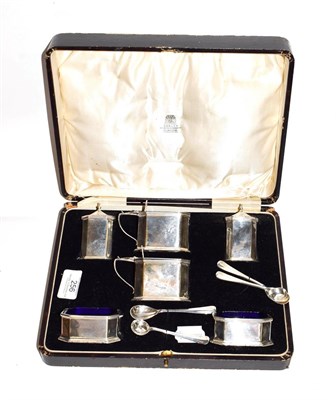 Lot 256 - A George V silver condiment set, by R. and W. Sorley, Chester, 1928, each piece oblong and with...