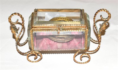 Lot 266 - A gilt-metal mounted glass box, the box oblong and on twisted wire supports, 17.5cm wide;...